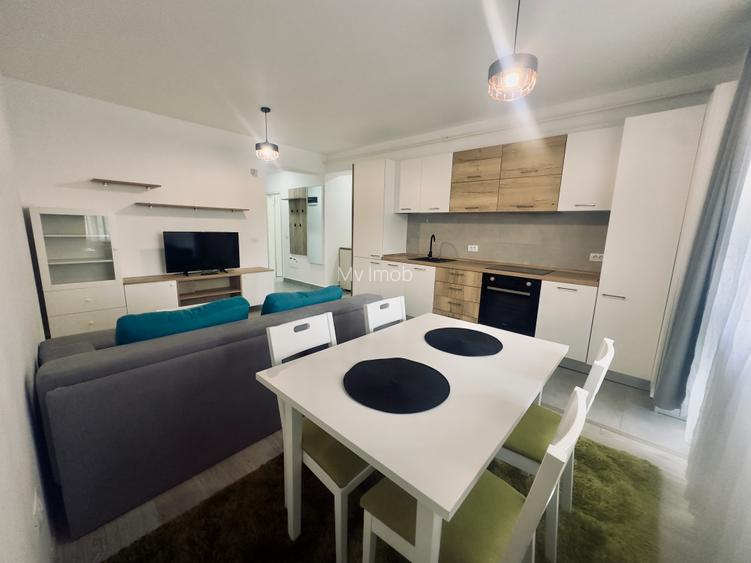 Apartament  cu 2 camere de inchiriat in zona Tractorul Coresi cu dressing,parter - 4