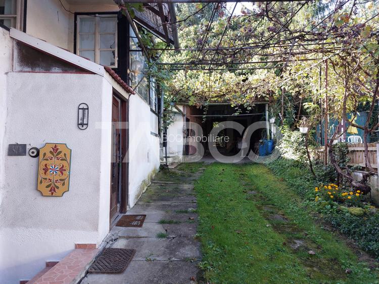 Casa de vanzare cu 2 apartamente separate si teren 544 mp Cisnadioara - 27