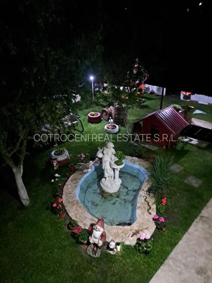 Refugiul Tău Verde: Casă Spațioasă cu Livadă, Anexe și Panouri Solare - 8