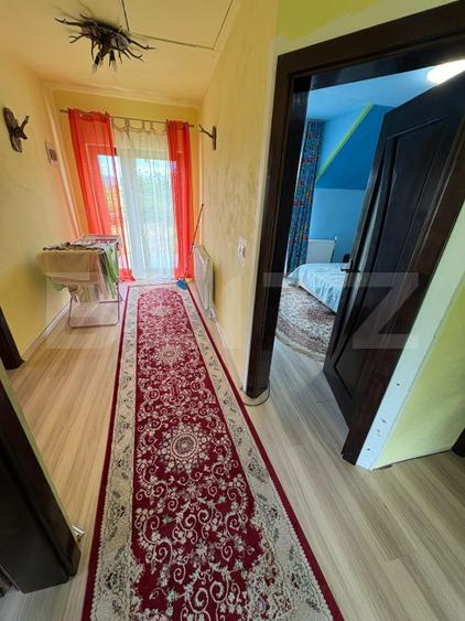 Casă de vânzare 140 mp, 5 ari teren, garaj interior – zona Pensiunea Morariu