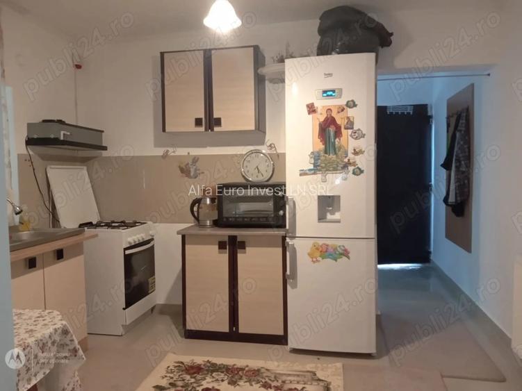 2 camere   in CASA  -central  -curte comuna-intrare separata - 7