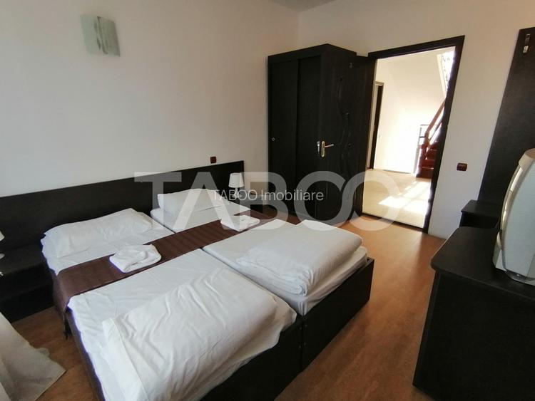 Pensiune 13 camere 16 bai sauna piscina si teren 1565 mp Cisnadioara - 32