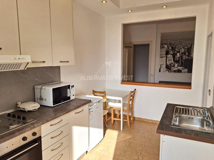 Vinzare apartament renovat cu design italian in  Piata Romana - 12