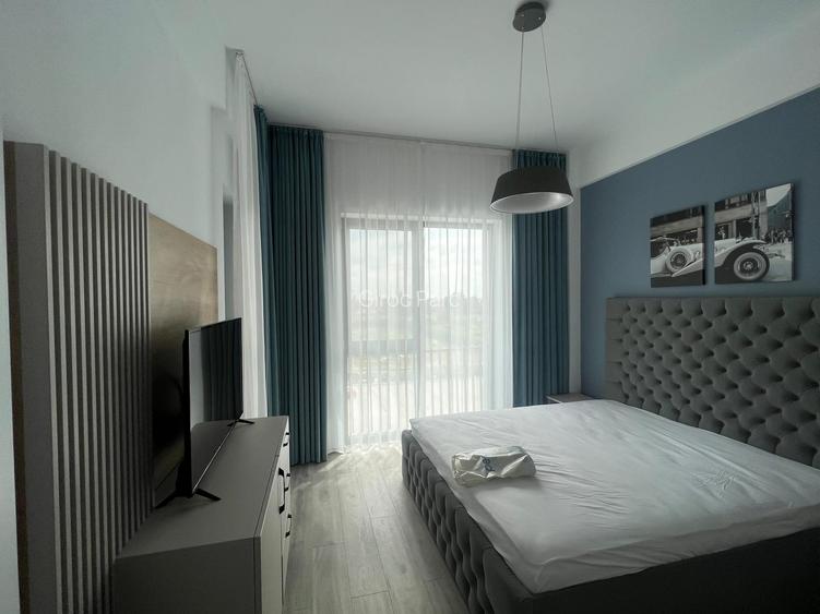 De inchiriat- Apartament nou - 16