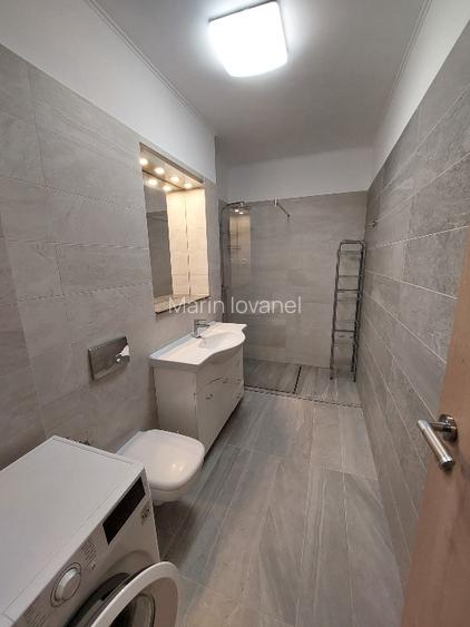 DAU IN CHIRIE GARSONIERA CU PARCARE LA SUBSOL BLOCUL PORSCHE STR A. V. VOEVOD 16 - 4