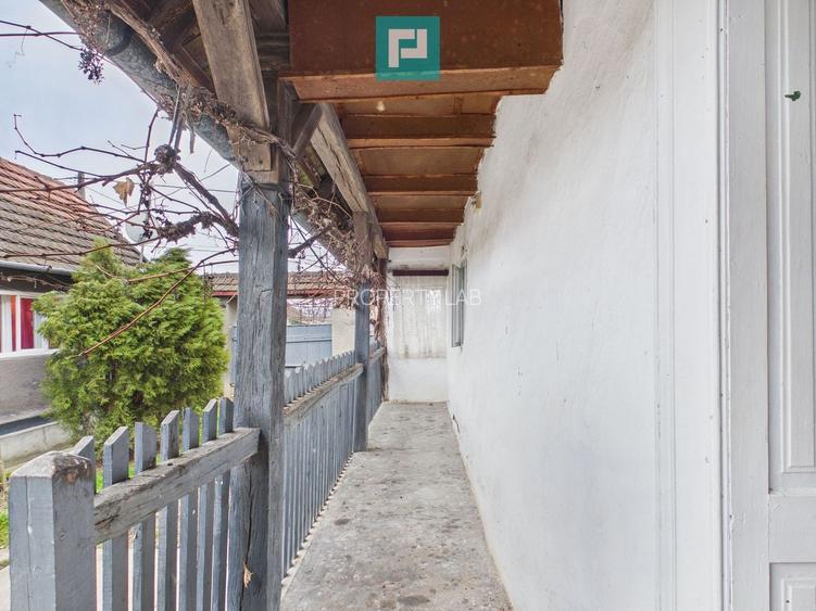Casă cu 2 corpuri și 4 camere în Tauț - 10