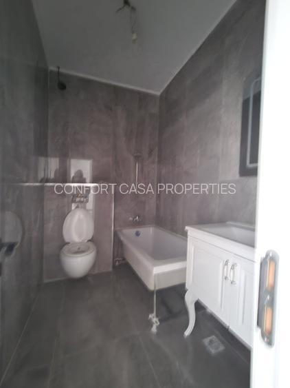 Decebal - Unirii -  Bloc nou - Apartament 3 camere - terasa - 2 grupuri sanitare - 11