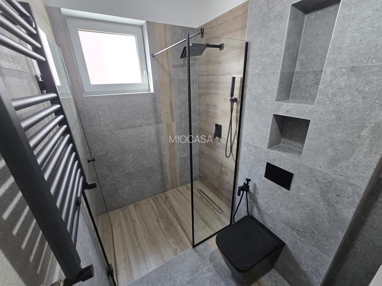 Apartament superb pe 2 niveluri. Bucatarie inchisa. 2 Locuri de Parcare. - 17