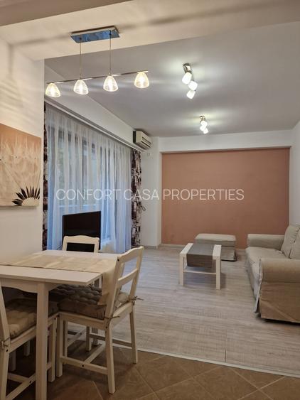 ASE -  Romana - Dorobanti - nou - 2 camere - mobilat modern - centrala termica - 17