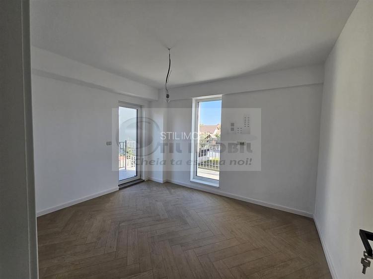 Apartament exclusivist dispus P+1E + curte 70mp - 9