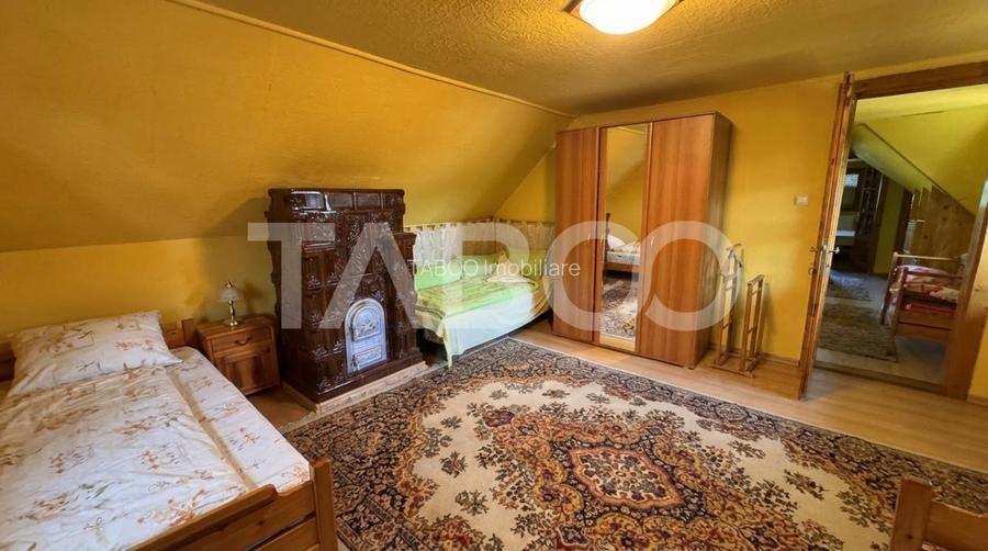 Casa de vanzare 6 camere loc de relaxare garaj teren 669 mp Cornatel - 21