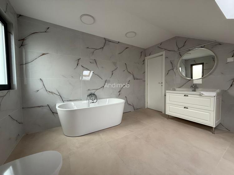 Vilă contemporană , finalizată în 2024, situată pe o stradă privată. - 24