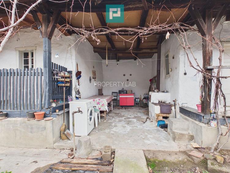 Casă cu 2 corpuri și 4 camere în Tauț - 9