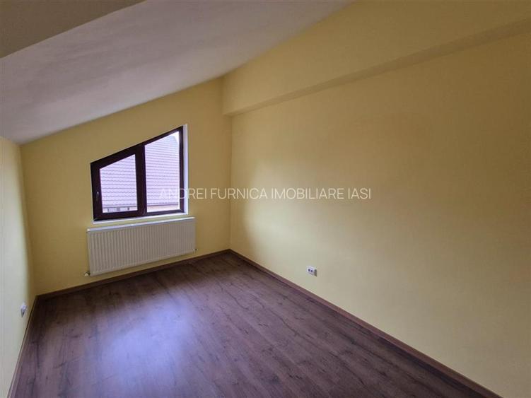Casa de vanzare individuala cu garaj in Bucium - 9
