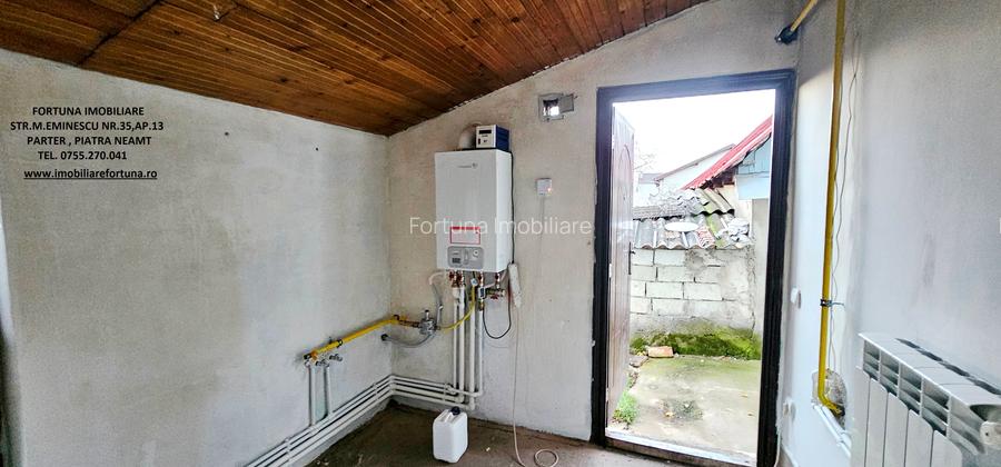 Casa individuala,cu 2 beciuri, anexe si 920 mp teren,la 10 minute de P.Neamt - 12