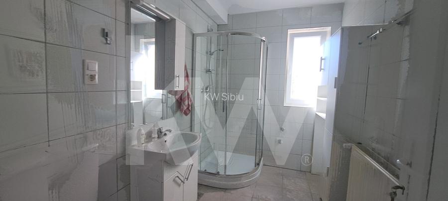 Apartament modern cu 2 camere, curte privată și 2 locuri de parcare