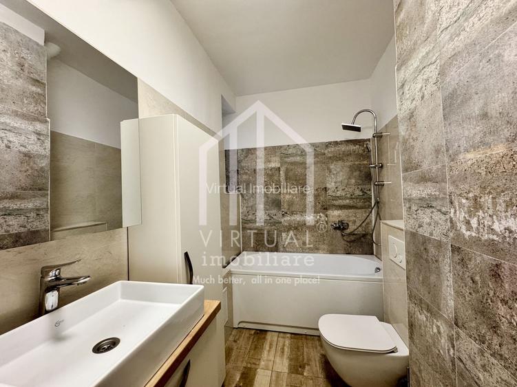 Apartament cu 2 camere, 70mp utili, etaj 1/2 - Zona Centrala - 10