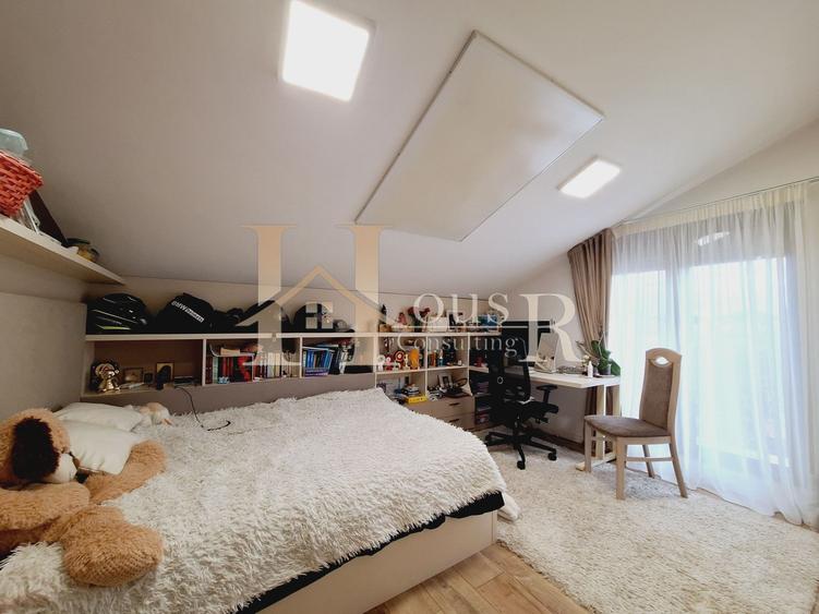 Casă individuală P+M, ideală pentru două familii – acces separat.