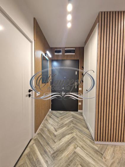 Apartament mobilat cu parcare subterana si terasa