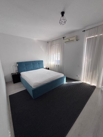 Casa la curte tip duplex