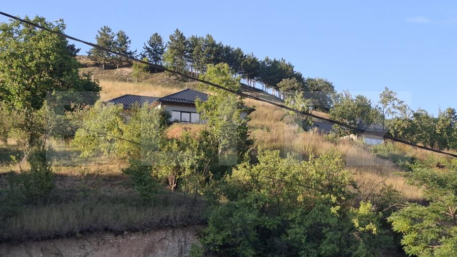 Casa pe un nivel, cu teren 2997 mp, panorama superba,Suceagu