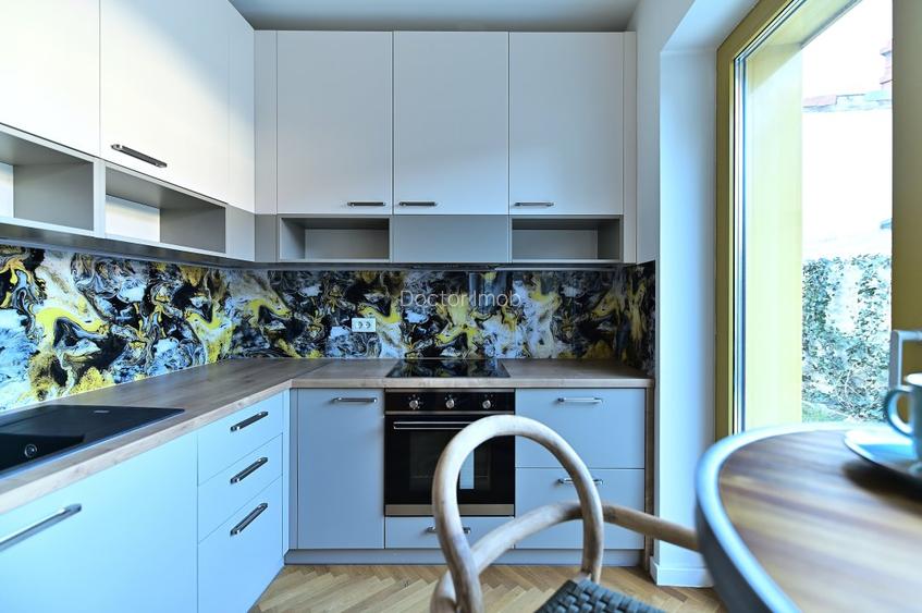 Rafinament, liniște și spațiu exterior privat în centrul Bucureștiului - 10