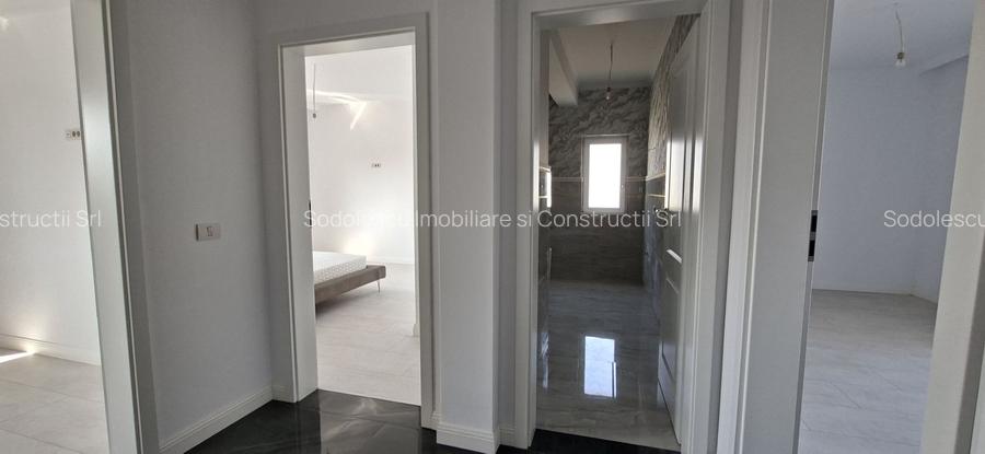 Duplex spatios cu garaj si pereti dublii - 12