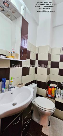 Locuinta individuala(apartament 4 camere)+spatiu comercial si teren ,Darmanesti - 10