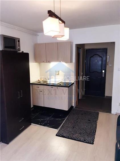 Garsoniera, Dambul Rotund - 5