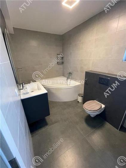 Casa cu 4 camere decomandate si curte libera 180 mp in Selimbar - 13