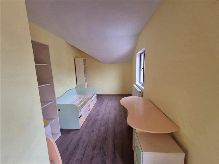 Casa de vanzare individuala cu garaj in Bucium