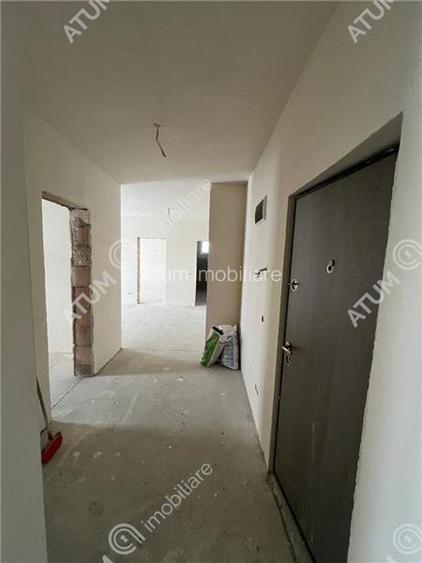 Apartament intabulat cu 3 camere 2 bai balcon si loc parcare Talmaciu - 11