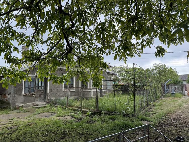 Teren intravilan  3447 mp, cu casa modesta, Desch. 30 m, str. Gr. Alexandrescu - 12