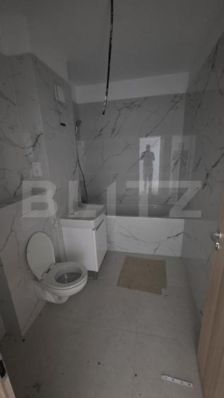 Apartament 2 camere, decomandat, etaj 3, parcare subterană inclusă