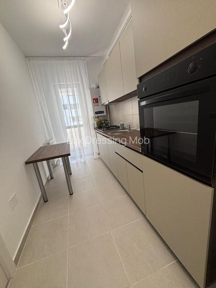 Garsoniera de inchiriat –Dotari: - TV +  loc  de parcare - 9