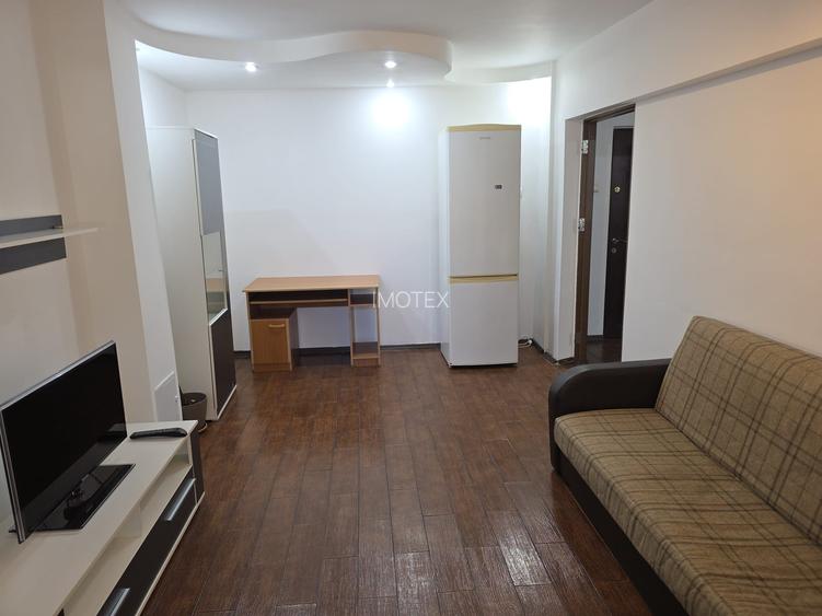 Garsoniera moderna transformata in doua camere in Gavana / Lumina - 3