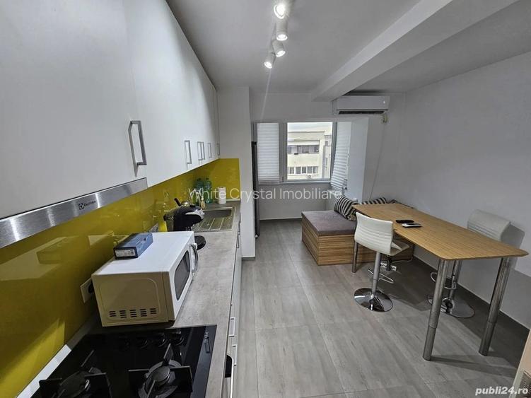 Închiriez garsonieră modernă, în zona Nerva Traian - Unirii - 3