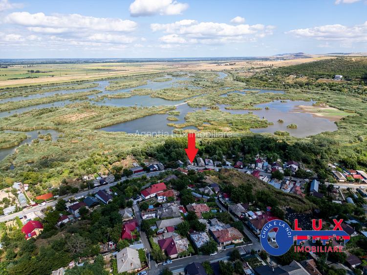 ID 7854 EXCLUSIVITATE – Teren cu casă și ieșire la canal - 7