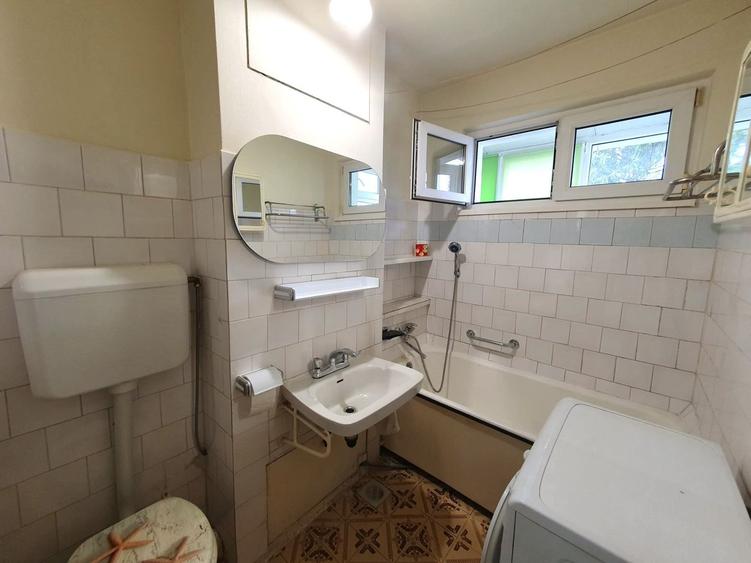 Apartament luminos cu vedere spre biserică, într-un cartier verde și liniștit.