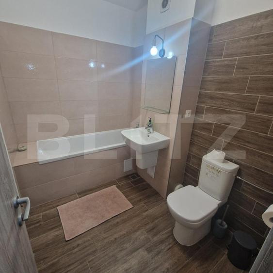 Apartament nou cu 3 camere, 2 bai -76 mp, decomandat, cu balcon -Tractorul
