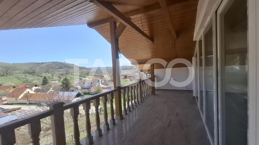 Casa de vanzare 405 mp utili 2 garaje 250 mp terase Slimnic Sibiu