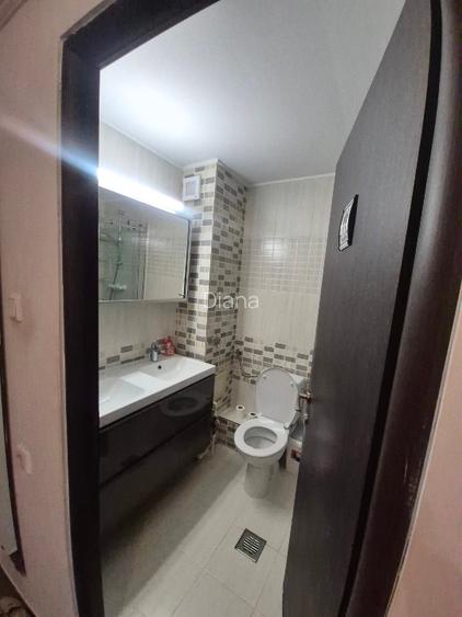 Un apartament cochet, cu parcare proprie, aproape de parcuri si birouri