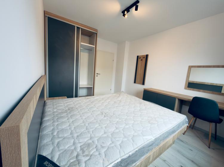 Apartament cu 2 camere de vanzare in zona Tractorul mobilat ,nou in garantie