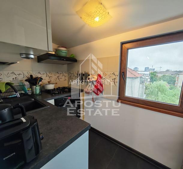 Apartament cu 2 camere de vanzare, centrala proprie, zona Aradului