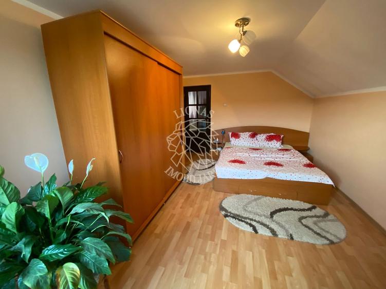 Casa 210 mp-garaj-curte amenajata-panouri solare-Ghinda