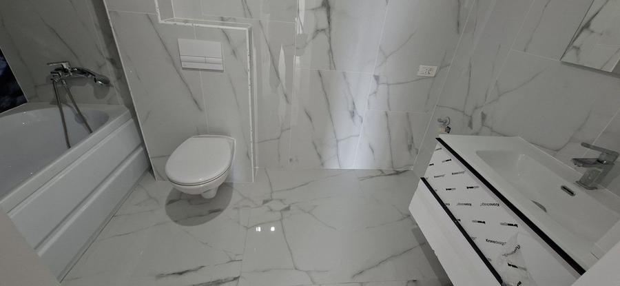 Apartament cu 3 camere si un loc de parcare