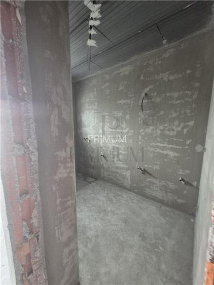 Duplex pe parter - 2 dormitoare - 2 bai - zona in dezvoltare - 11