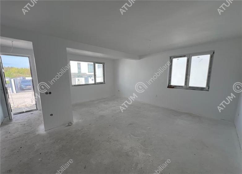 Casa cu 4 camere 2 bai curte de 50 mp zona Calea Cisnadiei Sibiu