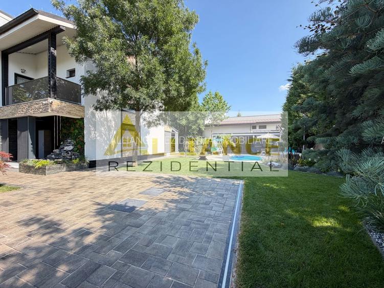 Casa P+1+M cu teren de 650 mp, piscina si curte complet amenajata