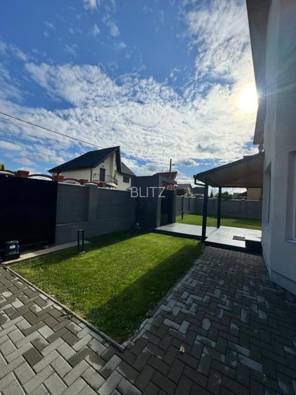 Casă modernă complet renovată, cu curte amenajată și sisteme inteligente